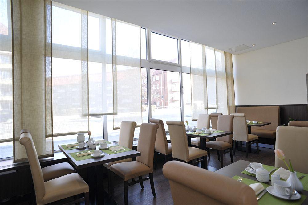 Heikotel - City Nord Hamburgo Restaurante foto